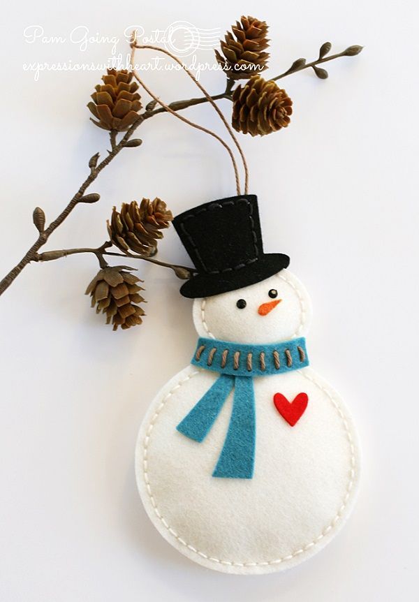 Decorazione di Natale fai da te in feltro e pannolenci: omino di neve